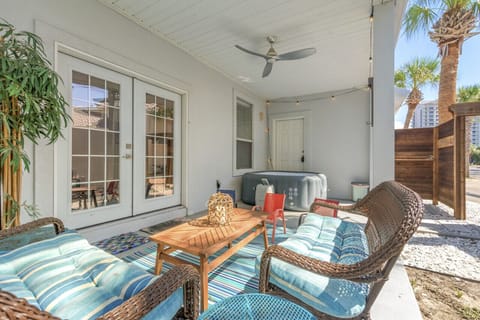 A perfect outdoor space with comfortable seating, a relaxing hot tub, and an outdoor shower, offering a luxurious and refreshing retreat!