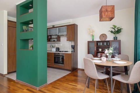 Living room with dining table and chairs.