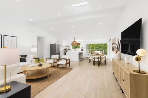 Living room from the front door. Never miss a moment in this wide, open space.