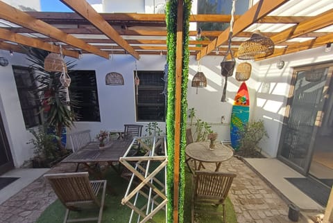 Outdoor area, screen separating the two units