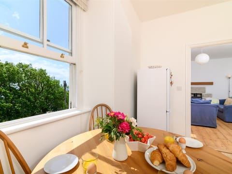 Kitchen with views to sea (through trees in summer) & large fridge / freezer