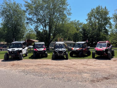 ATV & UTV

Ride with by yourself or ride with a group!  The Ranch is a great place for both.  We get many larger groups with different lodging or camping needs!   Share a cabin with another couple and UTV together!  With direct trail access, you can park your truck and trailer and ride all weekend!  Access Oconto County, the surrounding counties & the UP of Michigan.  