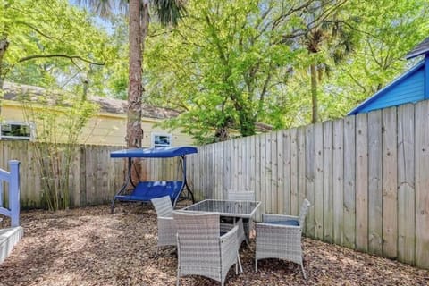 backyard with swing and dining table