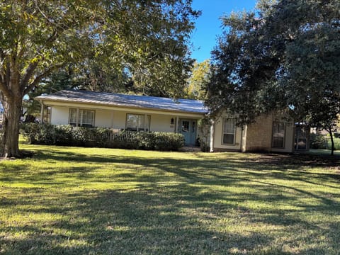 Your new home away from home! Enjoy sunsets on the porch in rocking chairs.