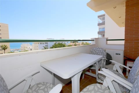 Terrace with sea views and outdoor dining area 