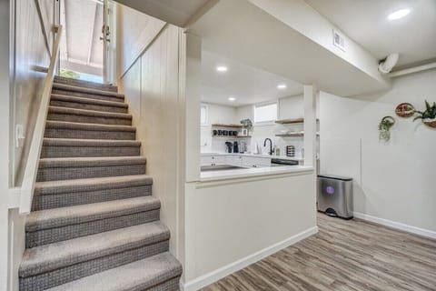 Enter the private unit through the side door and directly down the stairs.