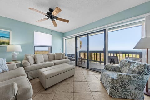 Lounge in the living area with panoramic ocean views right from the sofa.