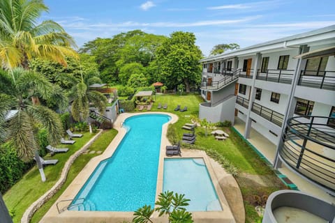 Dive into relaxation with a community pool right outside your door.