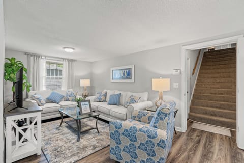This comfy living room offers space for everyone to gather!