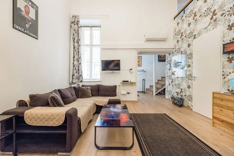 Living room with the openable sofa.