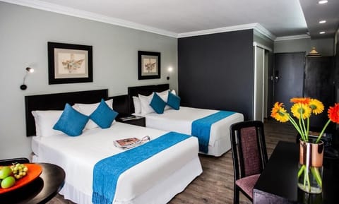 Stretch out in an airy room designed for easy relaxation.