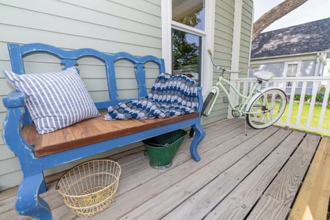 A charming porch bench, perfect for relaxing after a busy day
