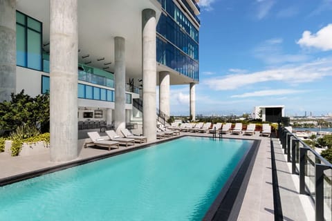 Lounge in the sun, then cool off with endless views.