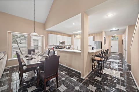 Second spacious dining table that sits 6 with full tableware and silverware included.