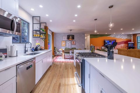 Whip up culinary delights in our spacious kitchen, featuring a large center island, and seamlessly flow into dining and living areas for effortless entertaining. It's the perfect space for cooking, gathering, and creating memories with every meal.