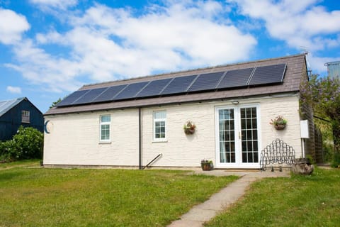 French doors open out to large lawn area