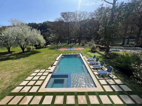 Stunning pool w/jacuzzi, pickleball court, outstanding Lake Austin view/access.