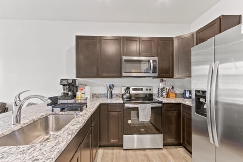 Modern Kitchen: Cook up delicious meals with sleek appliances and ample counter space!