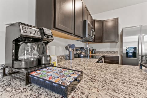 Kitchen: Brew your favorite blends with our stylish K-Pod coffee station! Perfect for coffee lovers!