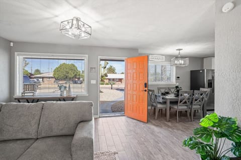 Open living & dining area w/ natural light, direct backyard access & an easygoing layout.