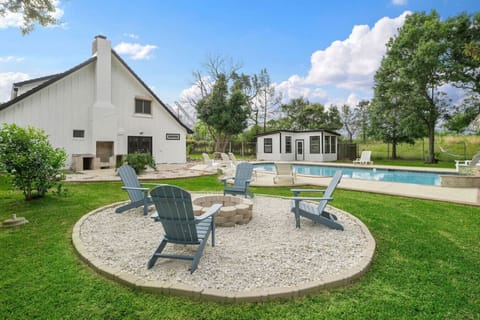 Unwind by the crackling fire pit and gaze at the night sky