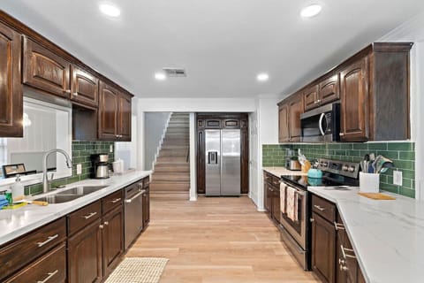 Step into culinary luxury with this sleek and well-designed kitchen space