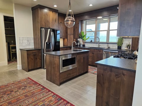 chef's kitchen, fully stocked. 2 dishwashers