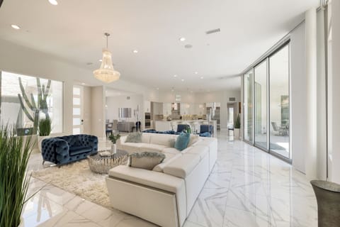 High-end furnishings, modern design, and floor-to-ceiling windows.