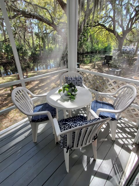 Back patio off of great room, water views and oh the beauty of nature!