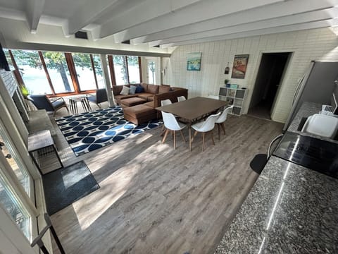 Open concept kitchen, dining and living space.