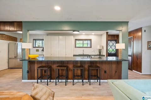 Island seating in kitchen. 