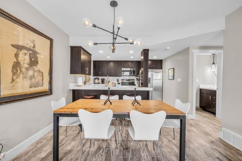 Dining room: 6-person dining table, adjacent to living room and kitchen
