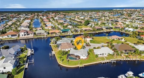 HUGE 145 FT SEAWALL - HOME IS SURROUNDED BY WATER INCLUDING 3 CANAL INTERSECTION