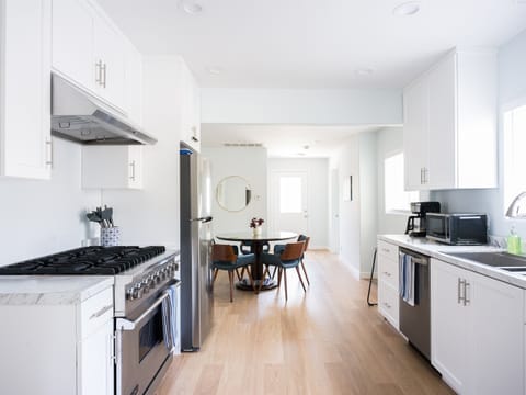 Huge gas range, oven and plenty of counterspace for meal prep.