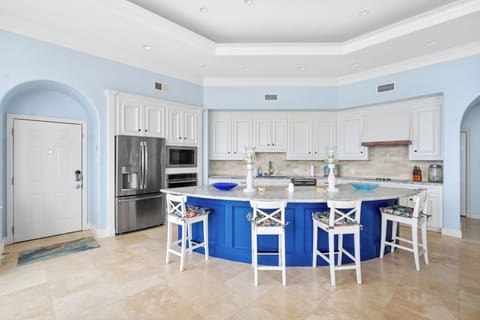 Open kitchen facing the living room and the beach
