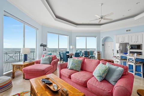 Living room with floor to ceiling windows 