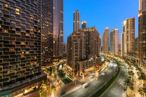 City View: Stunning skyline views and vibrant nightlife await right outside your door!