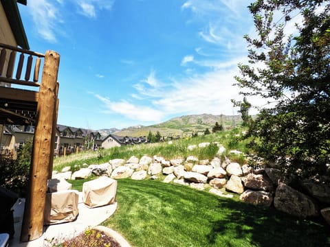 View of Powder's James Peak above Wolf Creek Golf Course. There is nice lounging furniture to enjoy the views.
