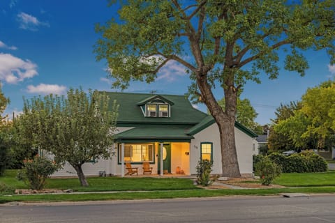 Exterior of home, large shade tree, grass yard, quiet and safe neighborhood.