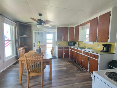 Dining table right in the kitchen to sit and enjoy a quick meal or drink your morning coffee.
