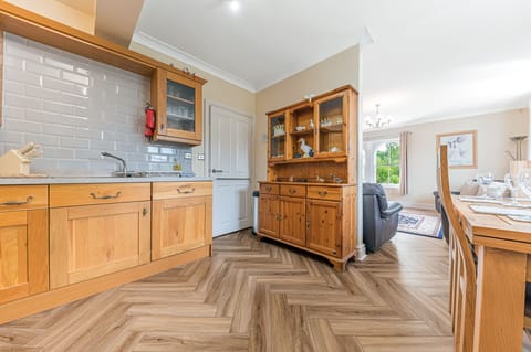 You will find an electric oven and hob, fridge/freezer, microwave and dishwasher in the kitchen