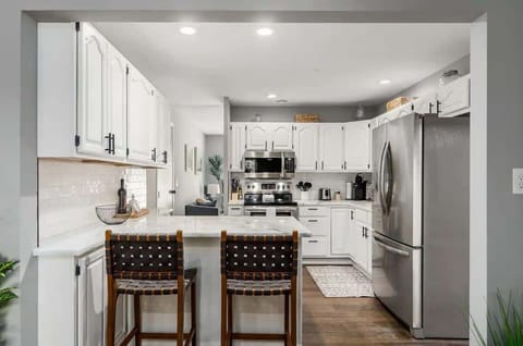 Lovely kitchen with bar stools and kitchen island great enjoying with family and friends