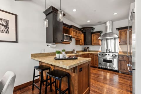 Gourmet kitchen with a Wolf Range.