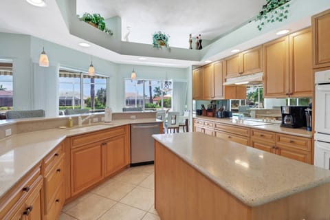 Cookware, dinnerware, many kitchen tools and small appliances are provided, including a drip and Keurig coffee maker.