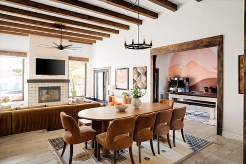 Embrace the inviting charm of our brown dining area, featuring plush chairs for an enchanting dining experience