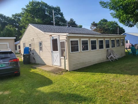 3 bedroom camp, 2 porches, some insulation, AC & heat, dual pane windows