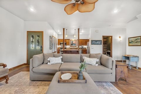 Enjoy a vast living room that leads directly into the kitchen and bar area!
