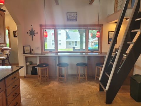 KITCHEN:  The home has a modern kitchen with all major appliances including a dishwasher and a good supply of cooking and dining utensils.