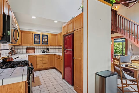 The living and dining areas open to the kitchen and there's oodles of counter space.
