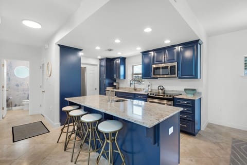 Kitchen with eat-in bar seating